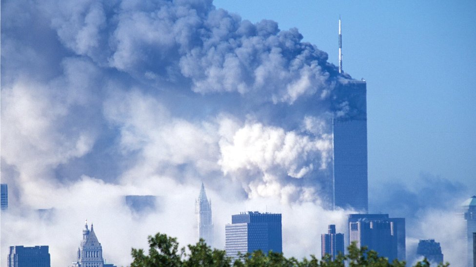 Two commercial jet liners crash into the World Trade Center, consequently causing both towers to implode and fall