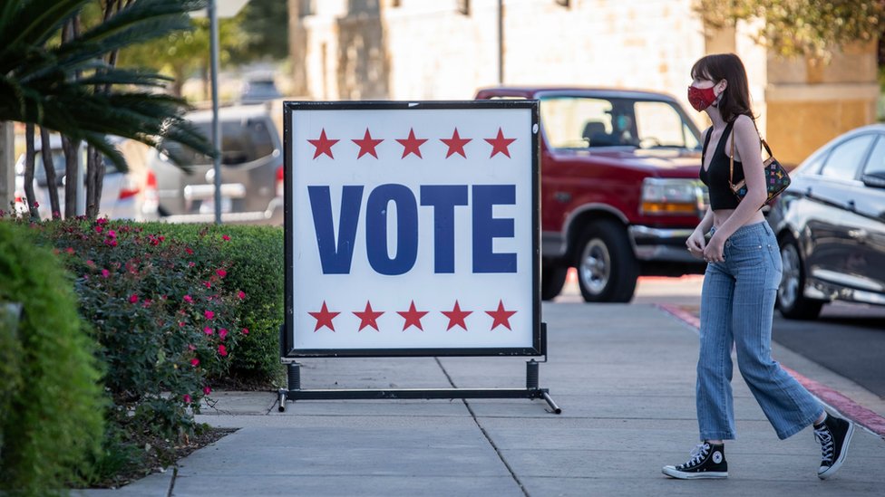 A voter walks to a polling station in Austin, Texas