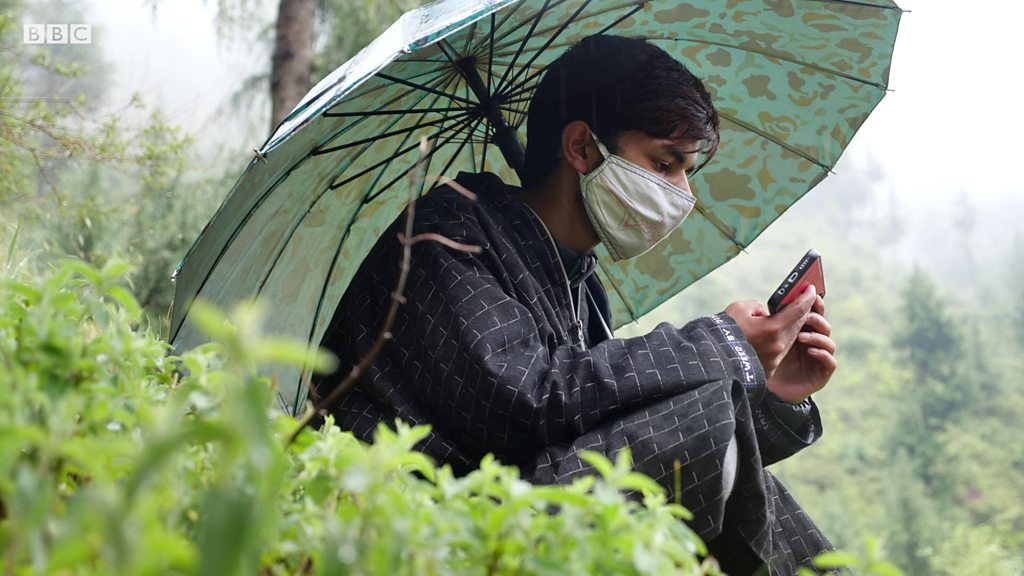 Education interrupted: Kashmir students climb mountain to cross digital divide