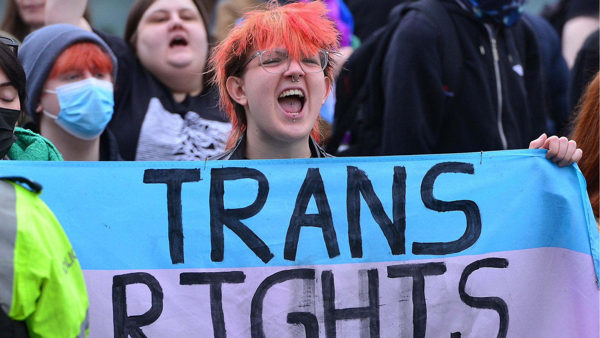 Transgender-related protesters divided by police in Belfast