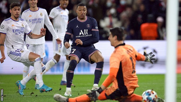 Paris St-Germain forward Kylian Mbappe scores against Real Madrid in the Champions League
