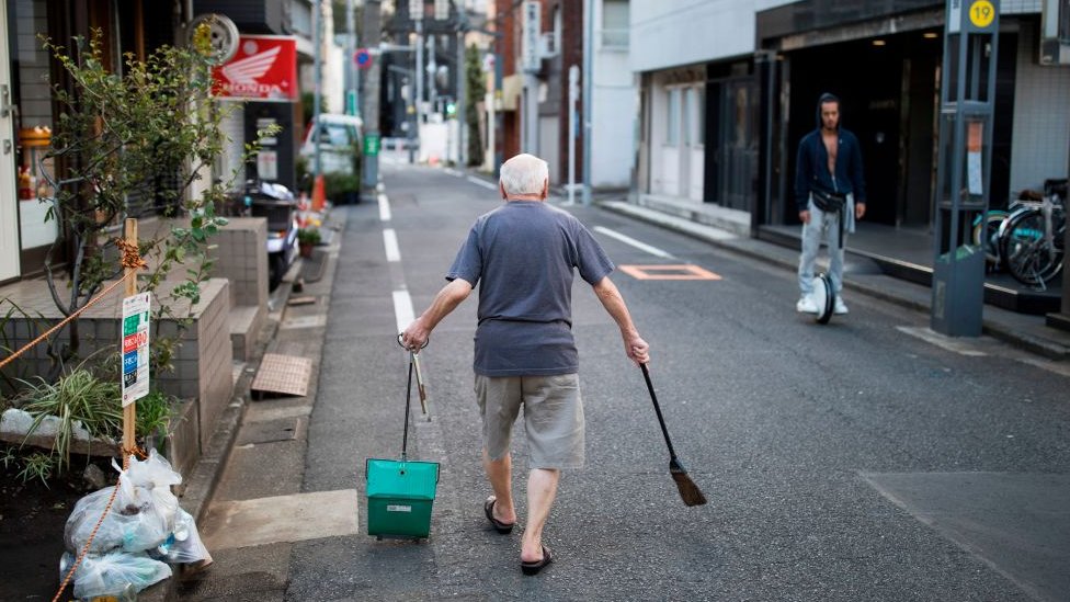 Man cleaning his neighbourhood
