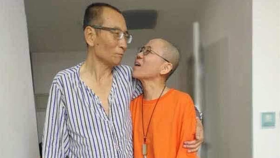 An undated handout photo made available through the twitter account of Guangzhou-based activist Ye Du, shows Chinese dissident Liu Xiaobo (L) with his wife Liu Xia, at an undisclosed location.