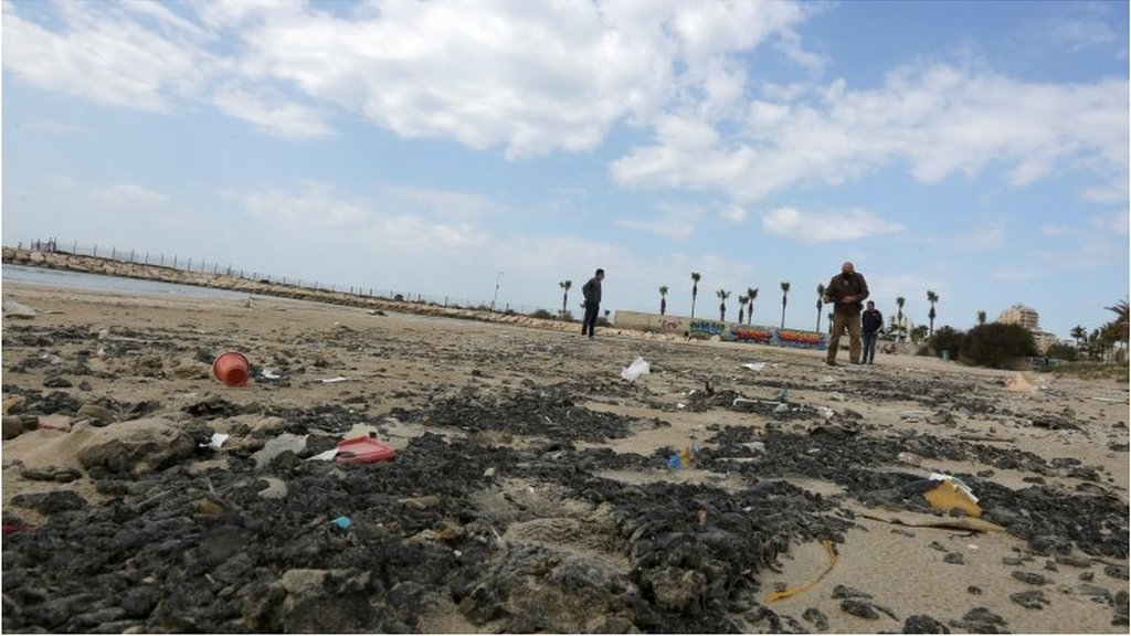 Clear-up of Israel's coastline after oil spill continues