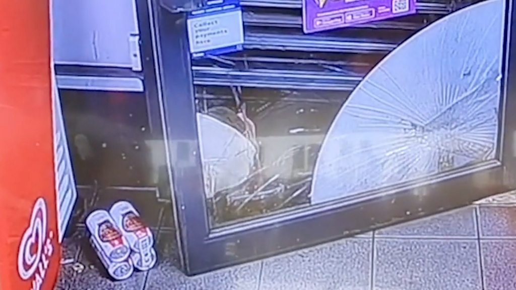 Durham robber drinks lager while trapped under shop shutters