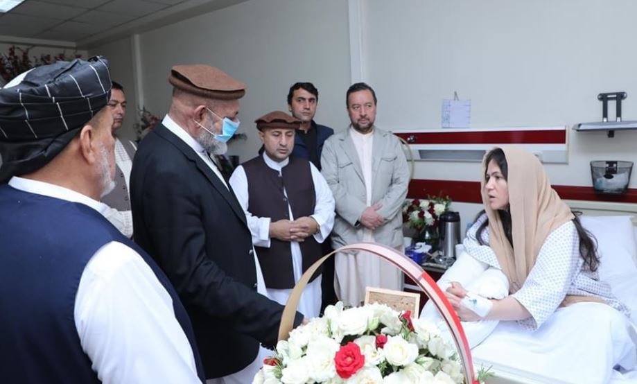 Fawzia Koofi being greeted by others