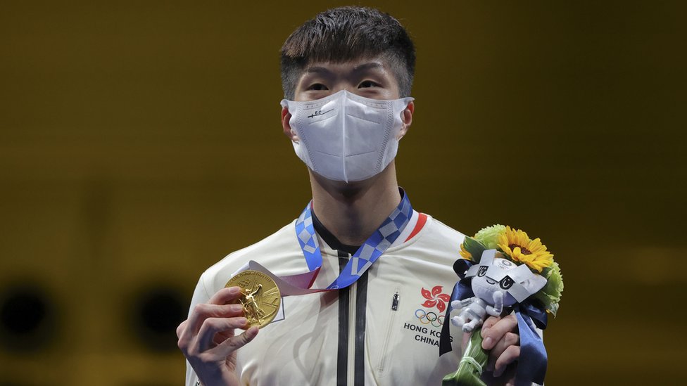 Gold medallist Cheung Ka Long of Hong Kong celebrates on the podium