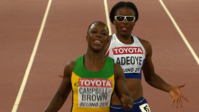 Veronica Campbell-Brown finishes in Margaret Adeoye's lane at the World Championships
