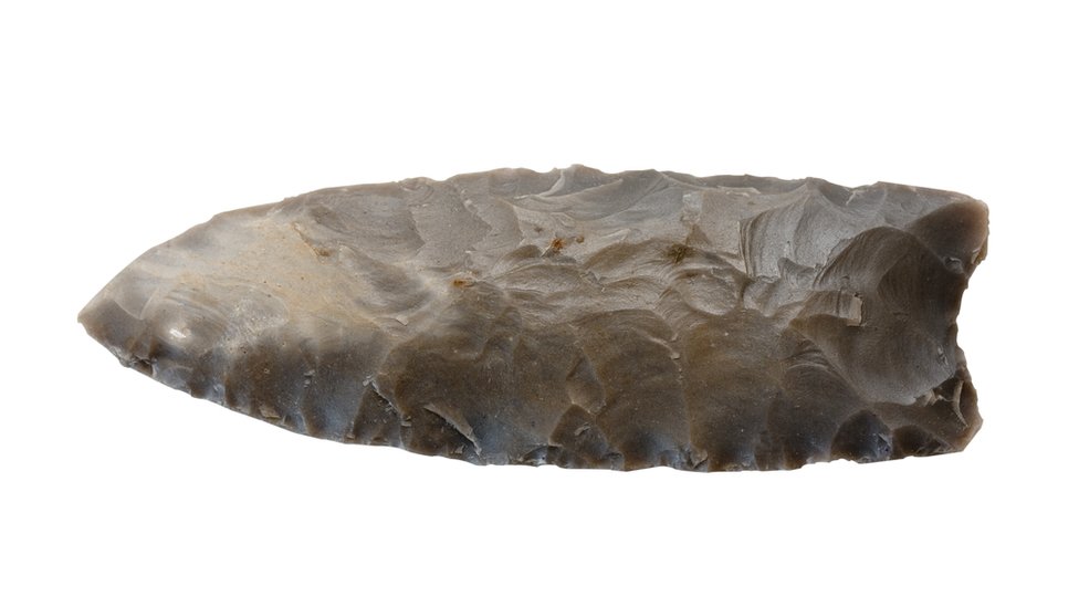 A stone point made by the Clovis people.