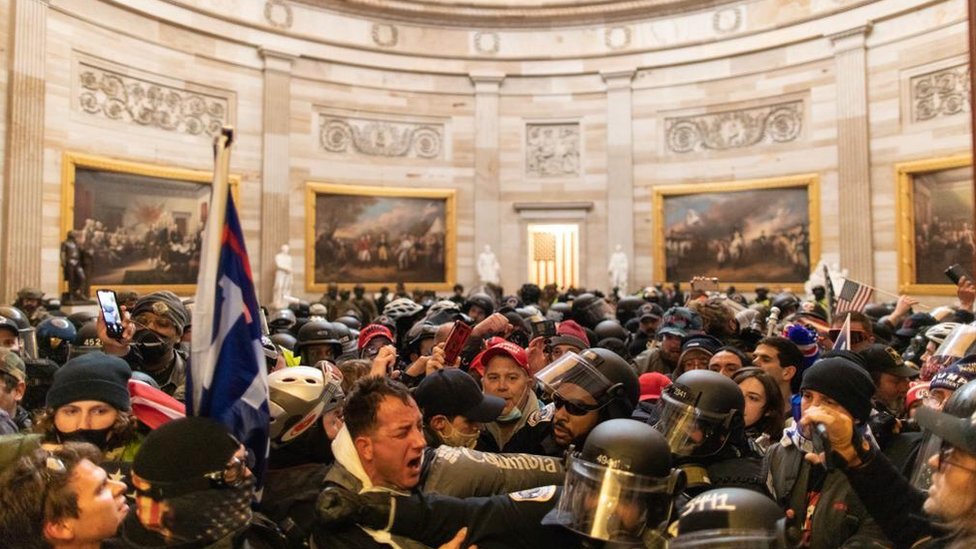 Police confront rioters who entered Capitol Hill buildings