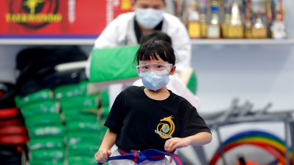 Pupils with face mask walk practice Taekwondo in Taipei, where dine in services and several schools have been suspended, following a cluster infection of the Delta variant in New Taipei, in Taipei, Taiwan, 8 September 2021
