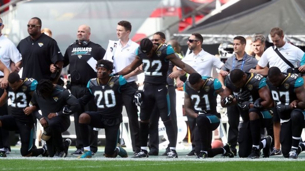 Philadelphia Eagles players protest during National Anthem at