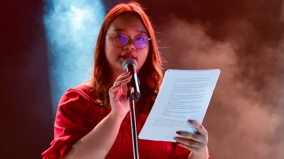 Student Union of Thailand spokesperson Panusaya Sithijirawattanakul reads a list of demands on August 10, 2020