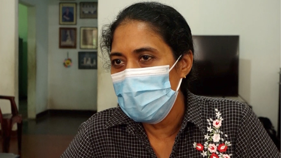 Nilushi Dissanayaka wears a face mask while speaking to the BBC in an interview