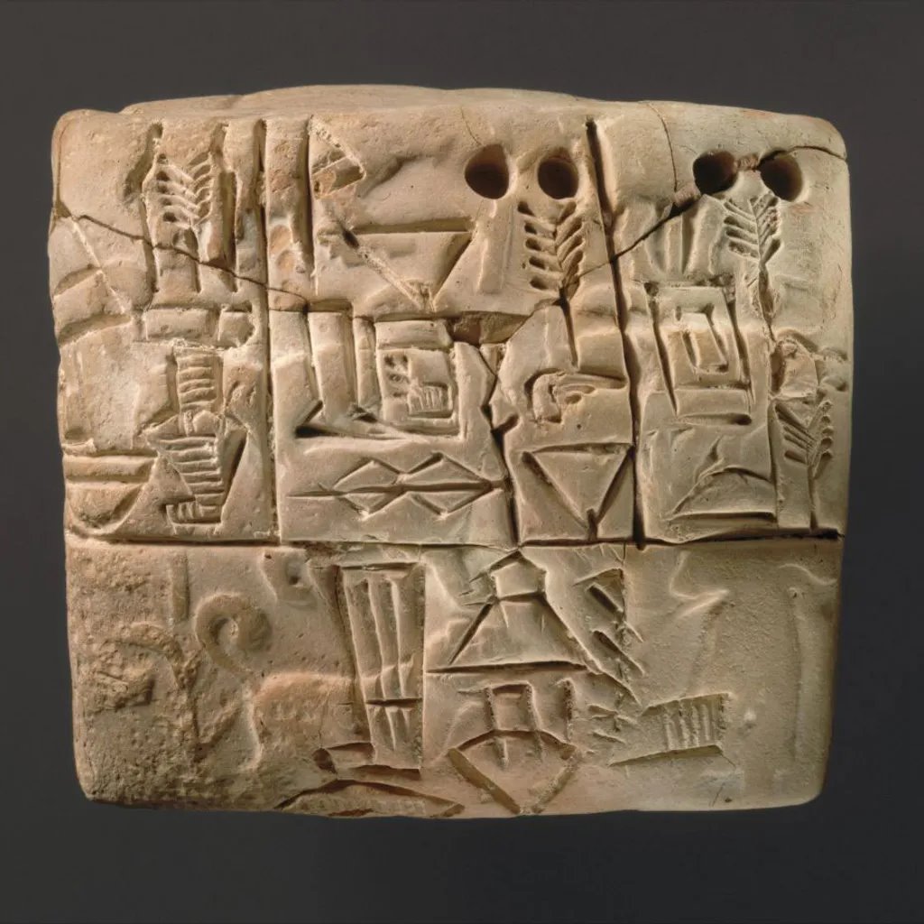 Mesopotamijska tabla sa klinastim pismom iz Uruka, koja sadrži opis muške figure, lovačkih pasa i divljih svinja