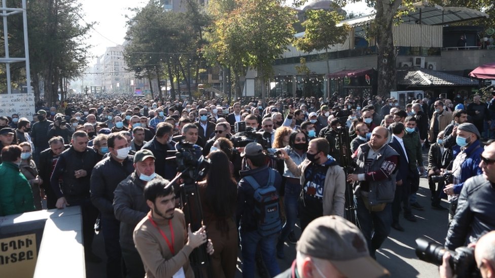 Armenian people attend a rally in the Freedom Square in Yerevan, Armenia, 11 November 2020.