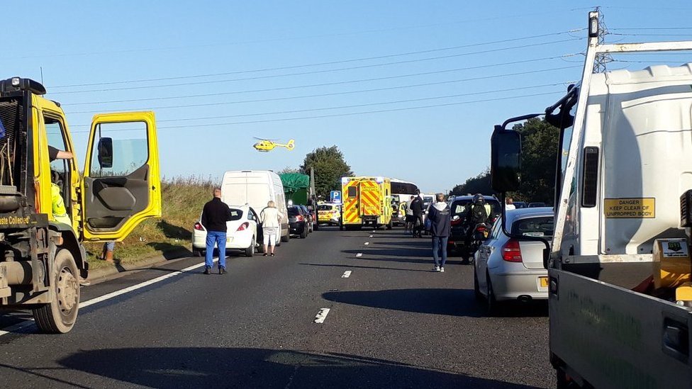 Driver injured in Norwich A47 bus and coach crash - BBC News