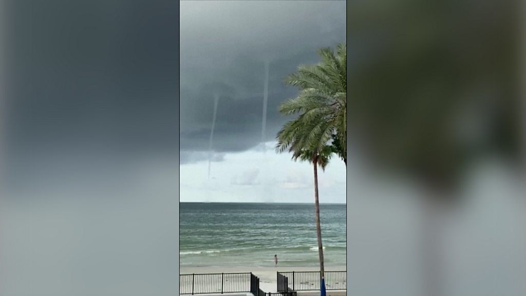 Towering twin waterspouts spotted by Florida beachgoers