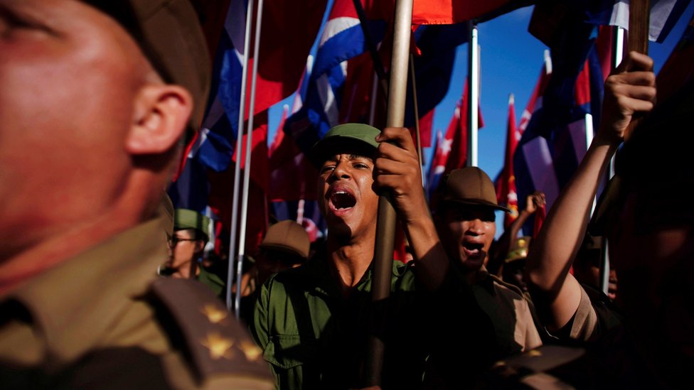 Cuban soldiers shout slogans during a May Day rally