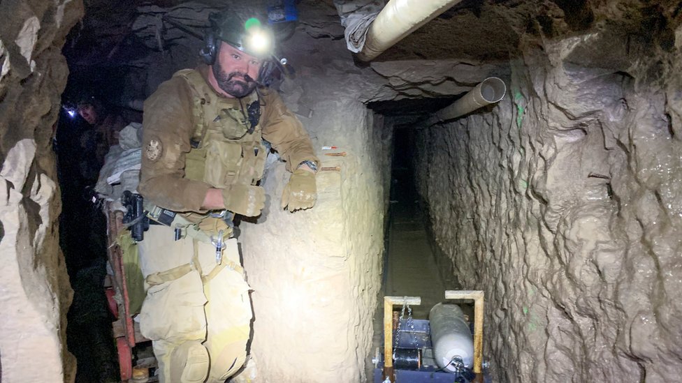 A US Customs and Border Protection (CBP) agent at a tunnel