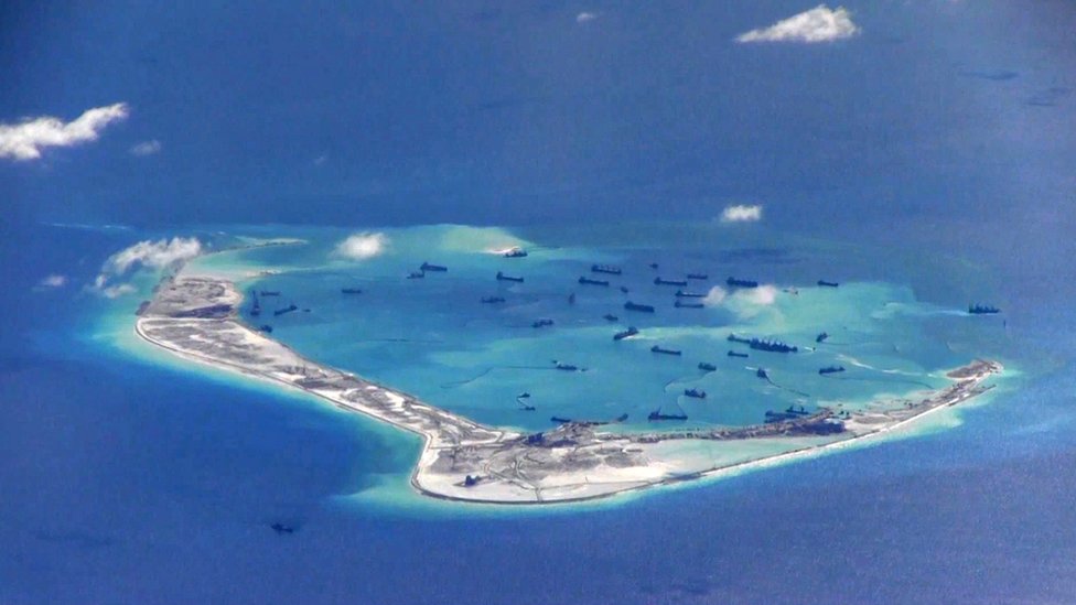 A still image from a US Navy video purportedly shows Chinese dredging vessels in the waters around Mischief Reef in the disputed Spratly Islands in the South China Sea