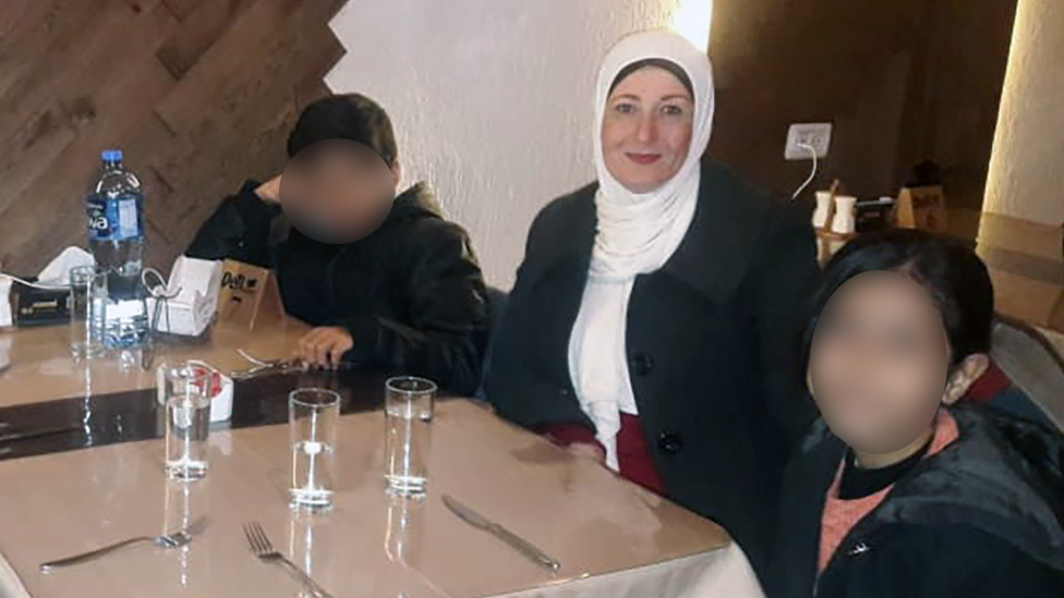 Najwa Sheikh-Ahmad with two of her five children.