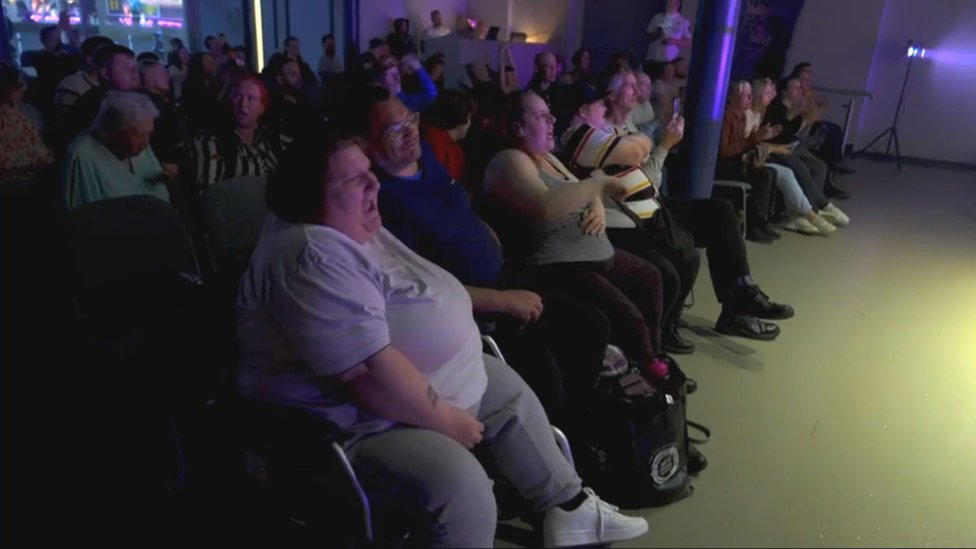 Audience at the wrestling church