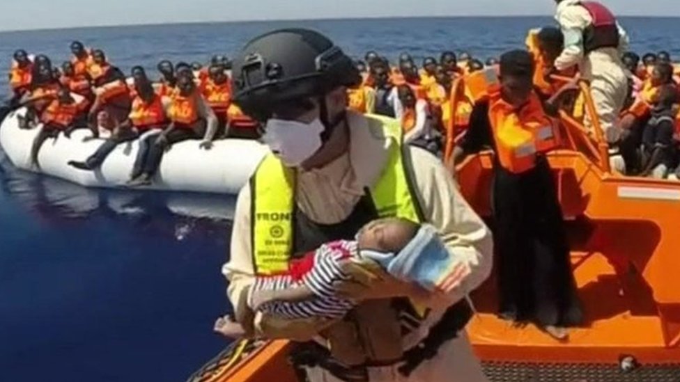 A baby rescued by Italian coastguard