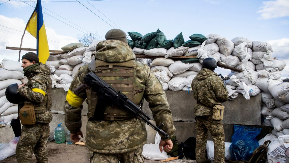 Ukrainian service members are seen, after Russia launched a massive military operation against Ukraine