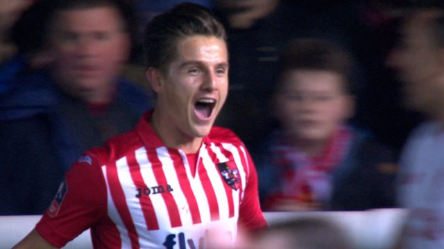Tom Nichols gives Exeter the lead against Liverpool