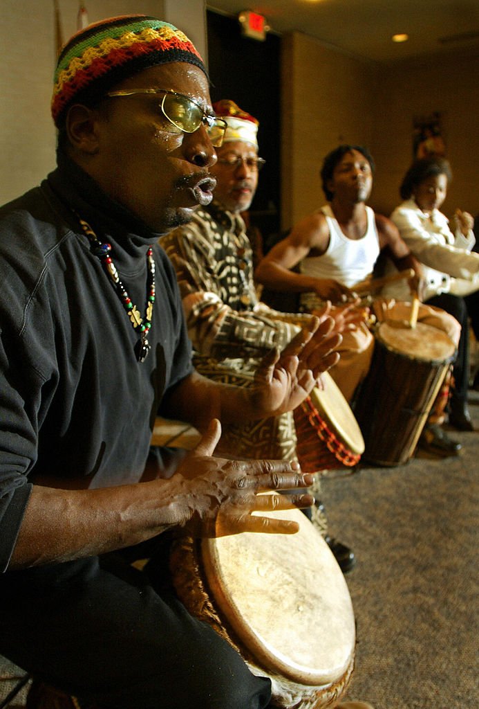 Members of the Malcolm X Drummers performing on December 26, 2003 at the Martin Luther King Public Library in Washington, D.C., the first day of Kwanzaa.