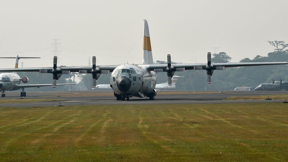 This picture taken on July 1, 2015 shows an Indonesia Air Force C-130 Hercules aircraft parked on the tarmac at Halim Air Base in Jakarta.
