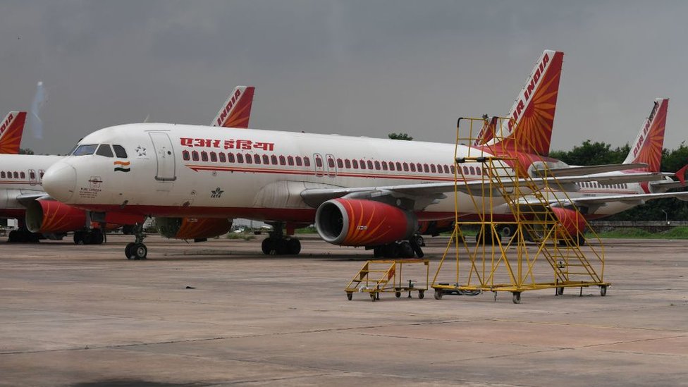 Air India planes are pictured at Indira Gandhi International Airport in New Delhi on September 10, 2018.