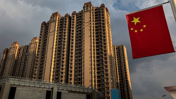 Evergrande: China property giant suspends shares as police target chairman