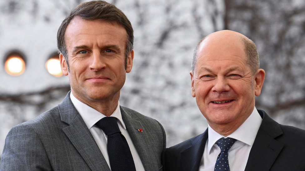 German Chancellor Olaf Scholz (right)welcomes French President Emmanuel Macron (left) before their trilateral meeting with Polish Prime Minister Donald Tusk for the consultation forum 'Weimar Triangle', at the Chancellery in Berlin, Germany March 15, 2024