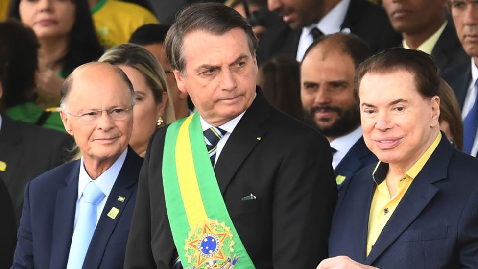 De izquierda a derecha, Edir Macedo, Jair Bolsonaro y Silvio Santos durante el desfile de la independencia.