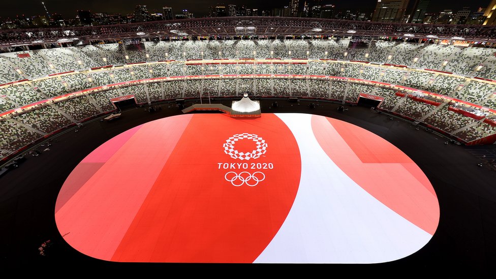 A general view inside the stadium as the Tokyo 2020 Logo and Olympic Rings are seen prior to the Opening Ceremony of the Tokyo 2020 Olympic Games at Olympic Stadium on July 23, 2021 in Tokyo, Japan.