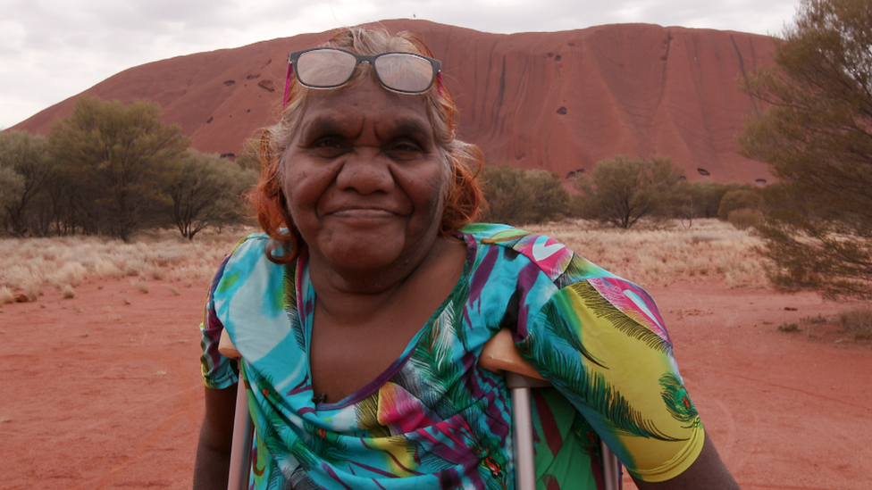 Pamela Taylor in front of the rock
