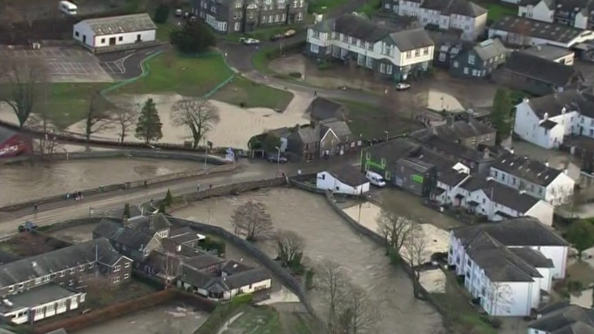 Storm Desmond: Helicopter footage shows scale of Cumbria floods - BBC News