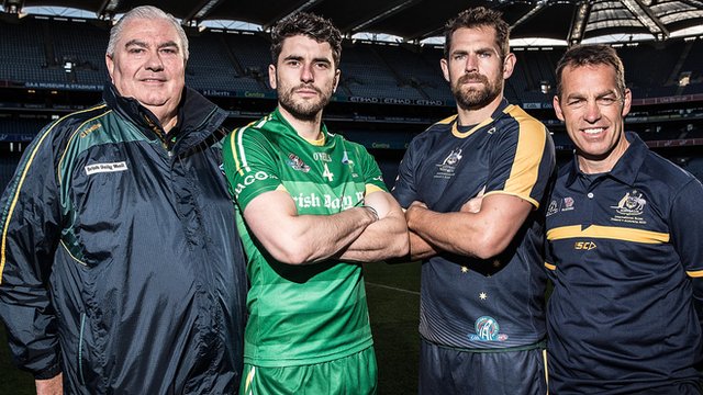 Ireland manager Joe Kernan and captain Bernard Brogan with Australia skipper Luke Hodge and head coach Alastair Clarkson
