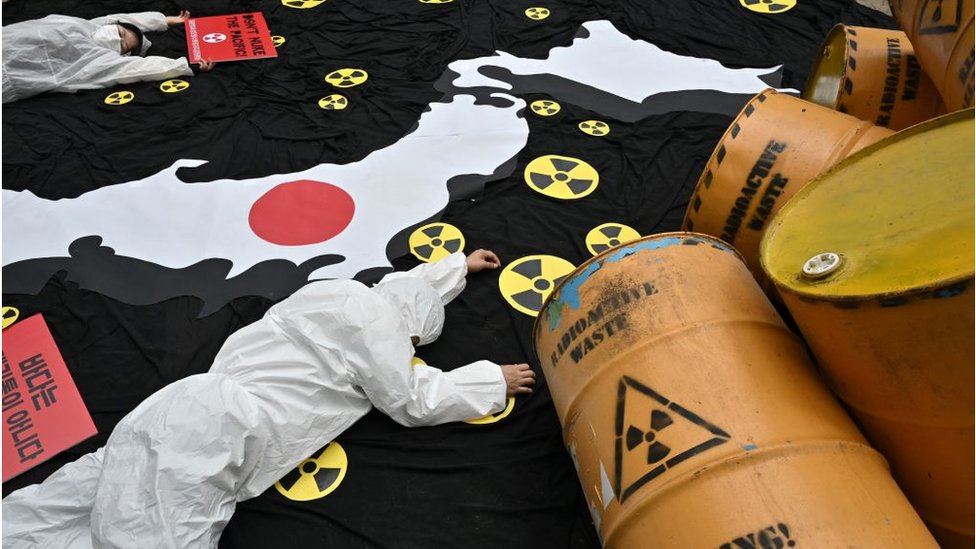 South Korean environmental activists perform during a protest in Seoul against Japan's plan to discharge Fukushima radioactive water into the sea, as they mark World Oceans Day on June 8, 2022.