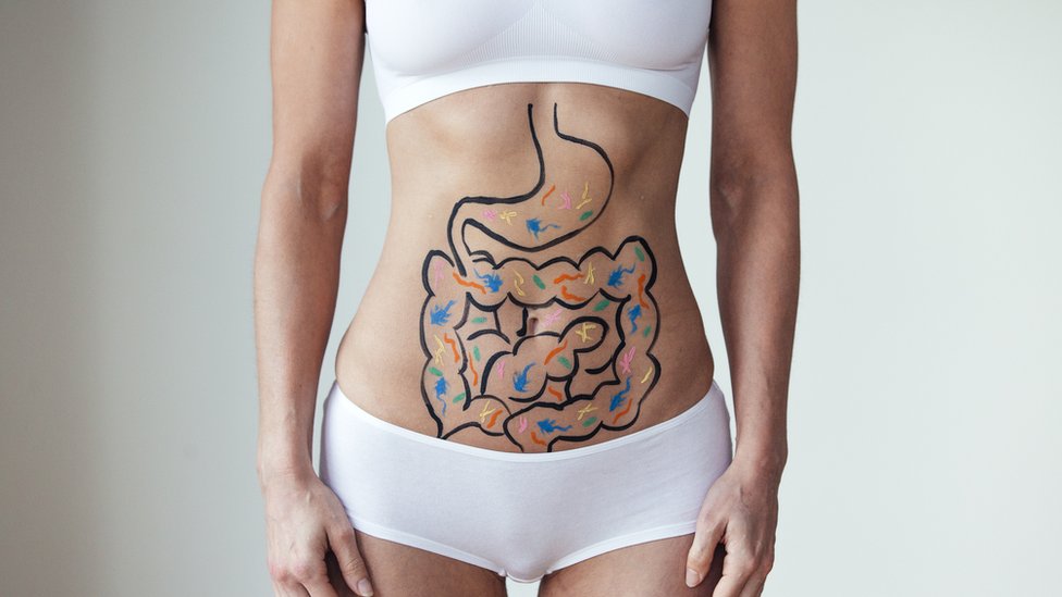 Intestines drawn over a woman's belly