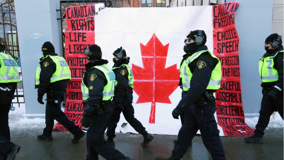 Canada truckers: Arrests as police warn of 'volatile' protesters