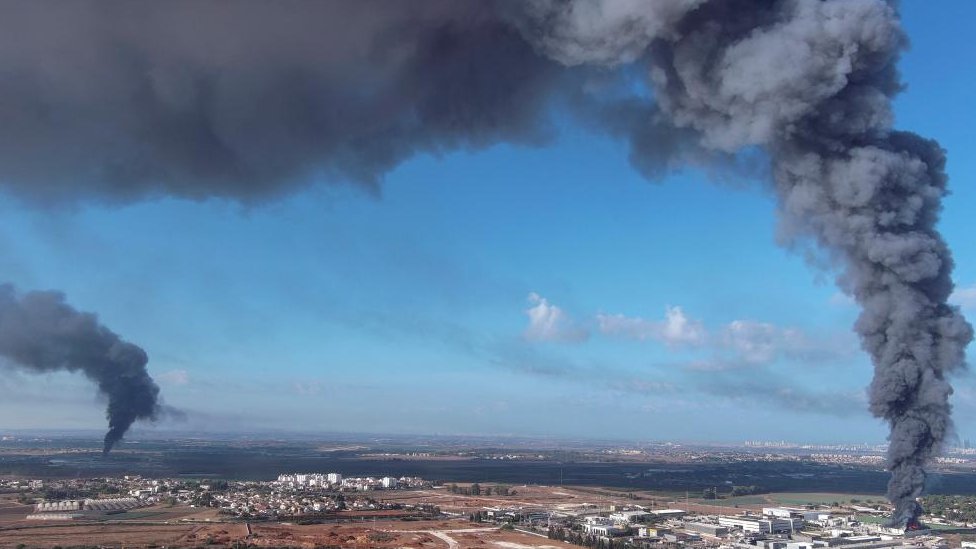 Smoke is seen in the Rehovot area of Israel