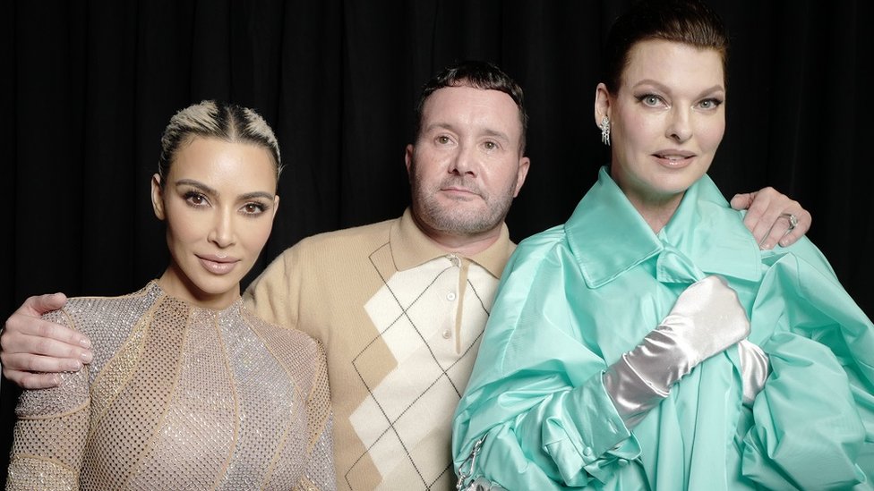 Kim Kardashian, Kim Jones and Linda Evangalista, pictured at a New York fashion show last year