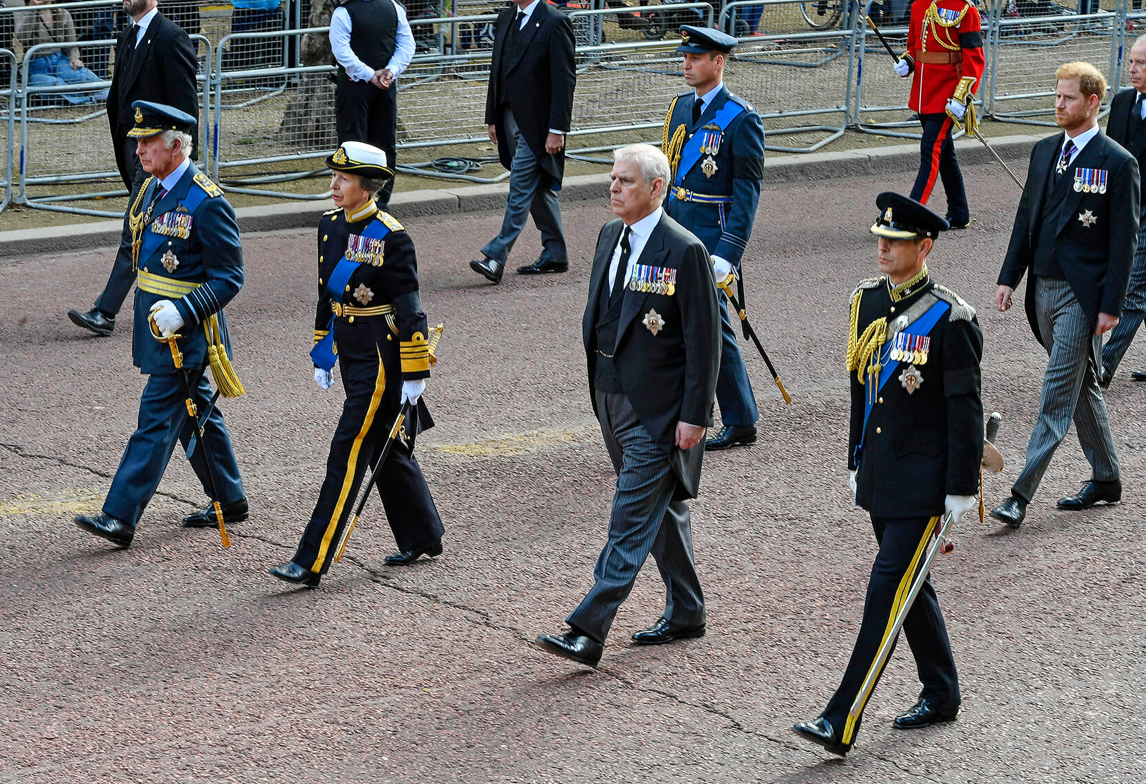 King Charles III, Princess Anne, Prince Andrew and Prince Edward walk behind the Queen's coffin