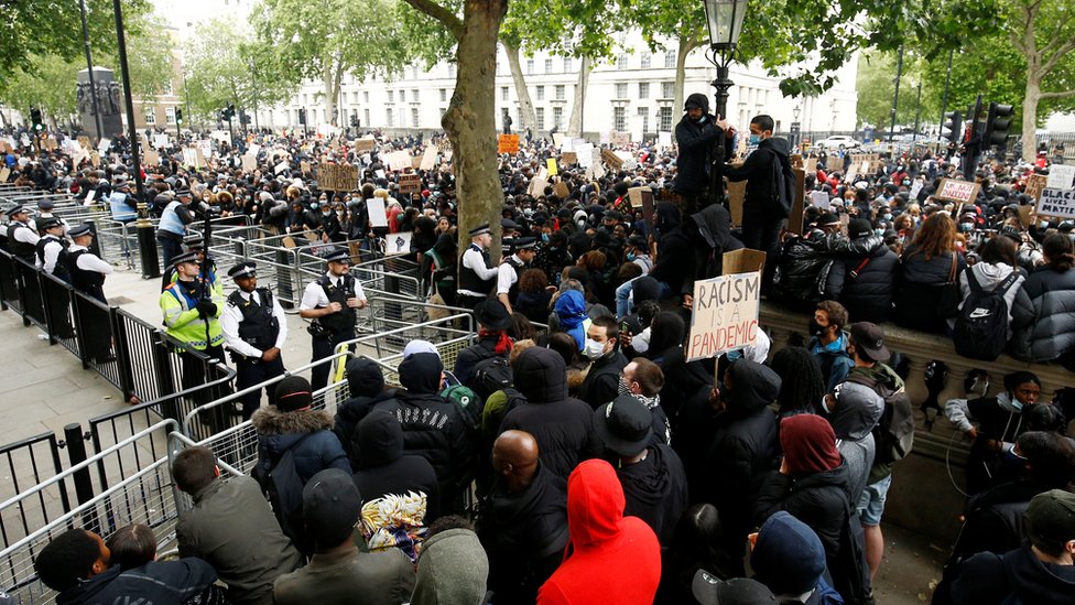 Demonstrators and police in Whitehall
