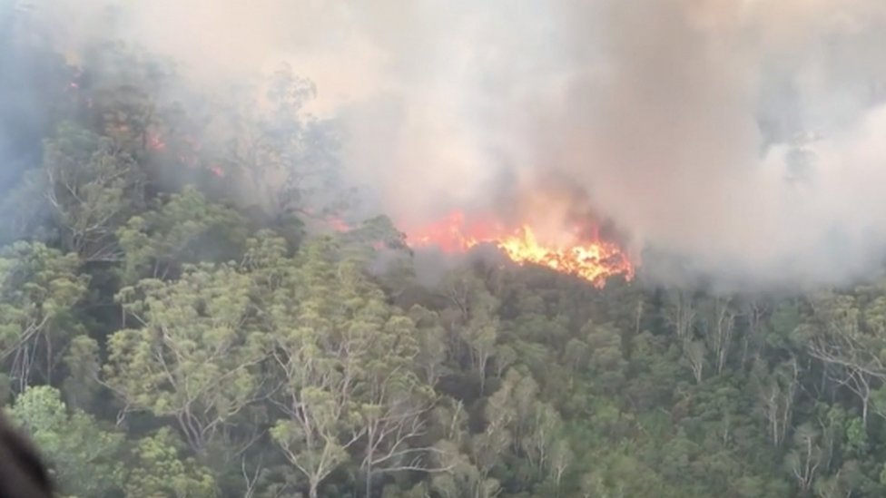 An aerial view shows bushfires on Fraser Island, Queensland, Australia