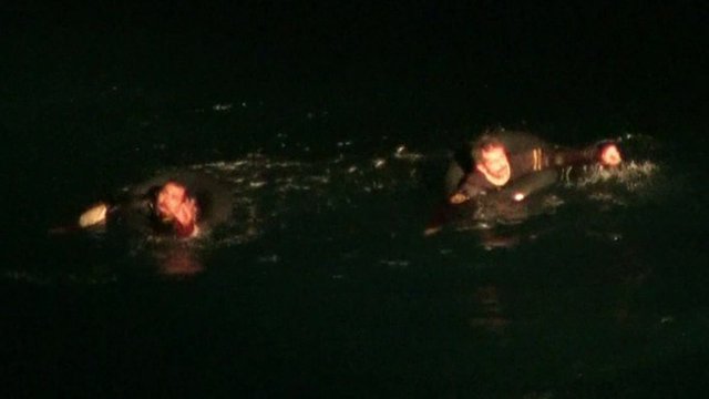 Migrants in sea calling for help