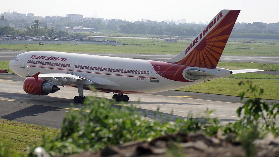 An Indian Airlines plane taxes towards takeoff at Mumbai airport on September 27, 2009.